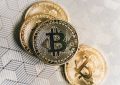 Close Up Photo of Four Bitcoins