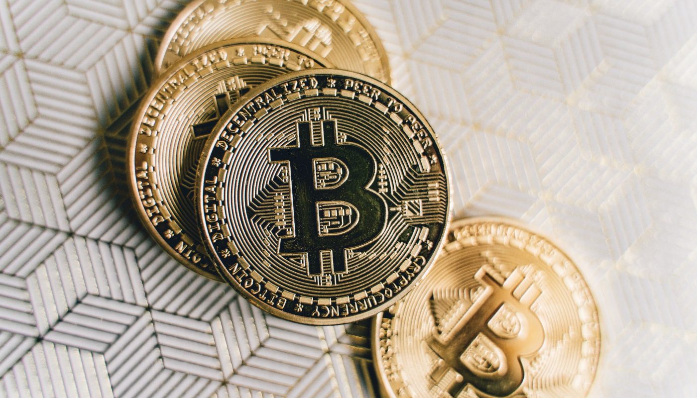 Close Up Photo of Four Bitcoins